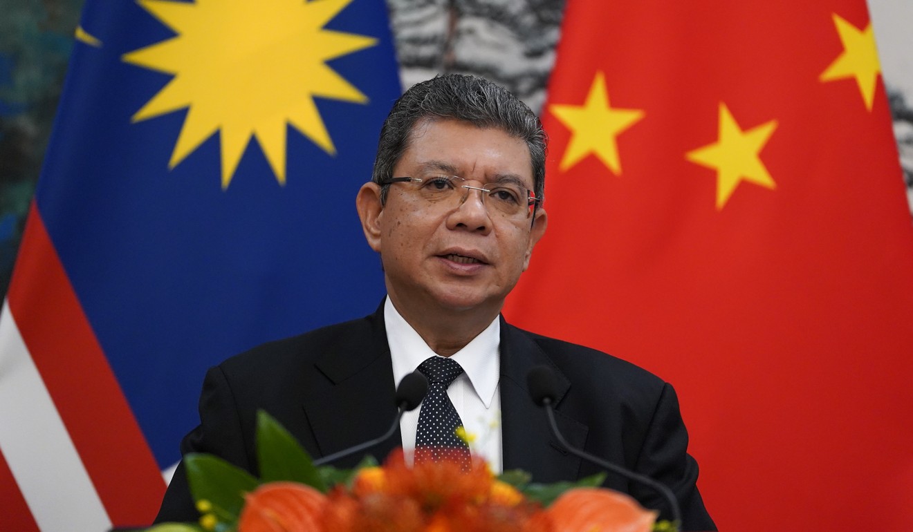 Malaysian Foreign Minister Saifuddin Abdullah says the new dialogue mechanism will be managed by the two countries’ foreign ministries. Photo: EPA
