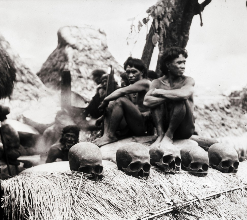 Igorot headhunters with human skulls, in 1913. Photo: Alamy