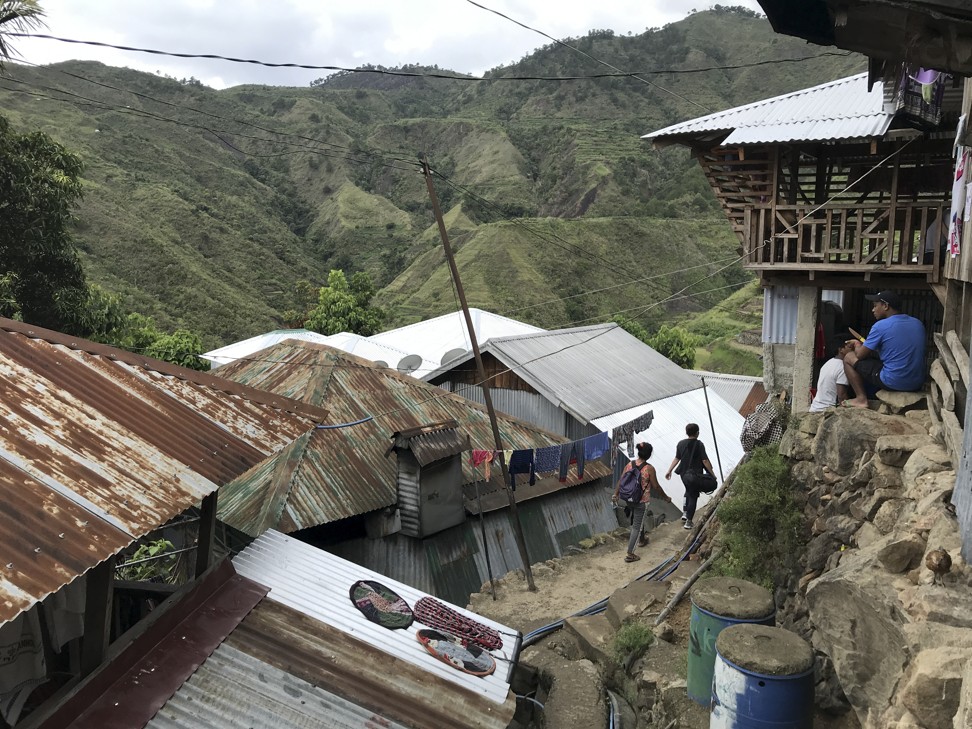 Cheek-by-jowl village homes, in Buscalan. Photo: Ian Gill