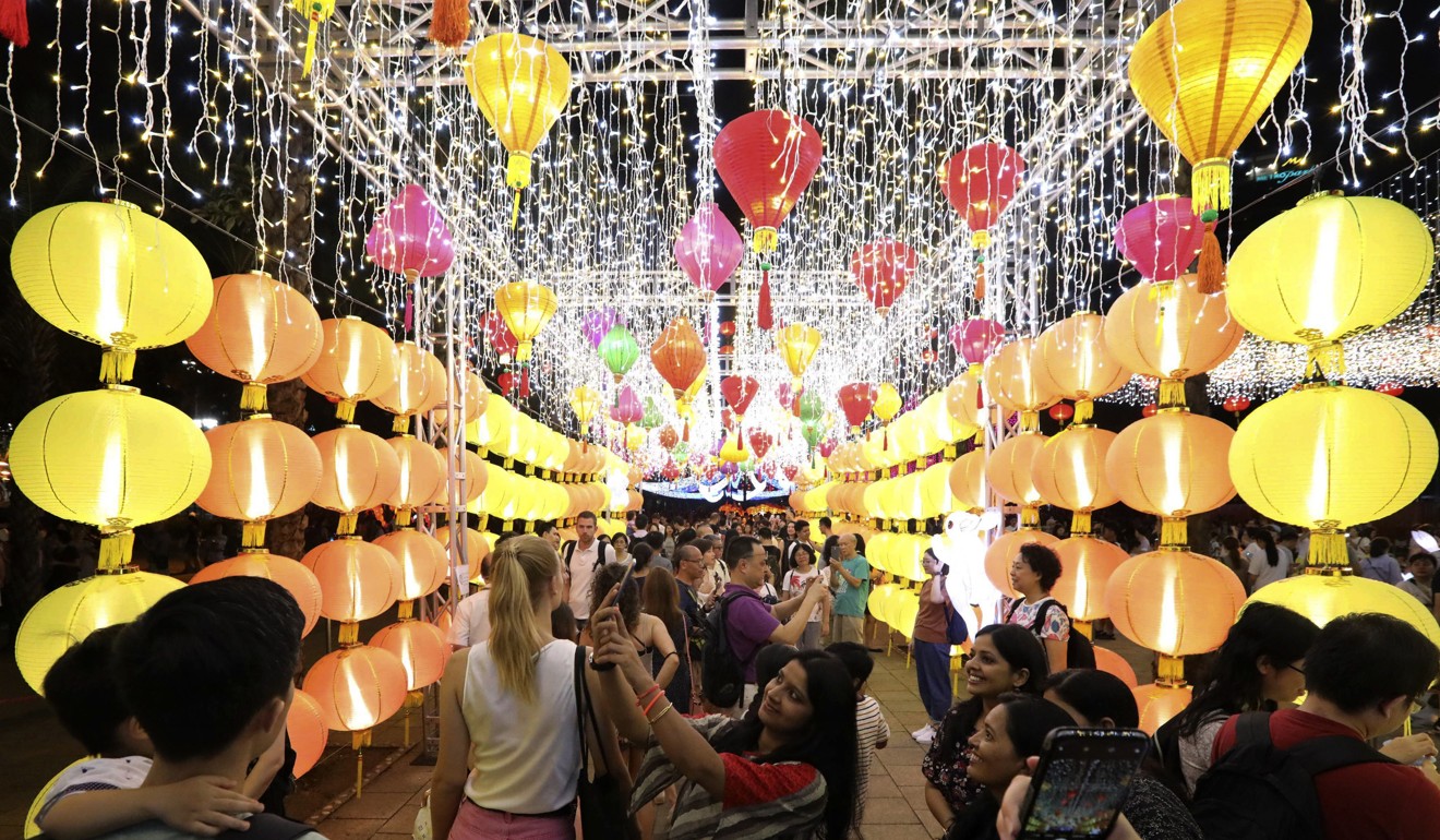 Visitors enjoying the Mid-Autumn Festival lantern show at Victoria Park in Causeway Bay. Photo: Felix Wong