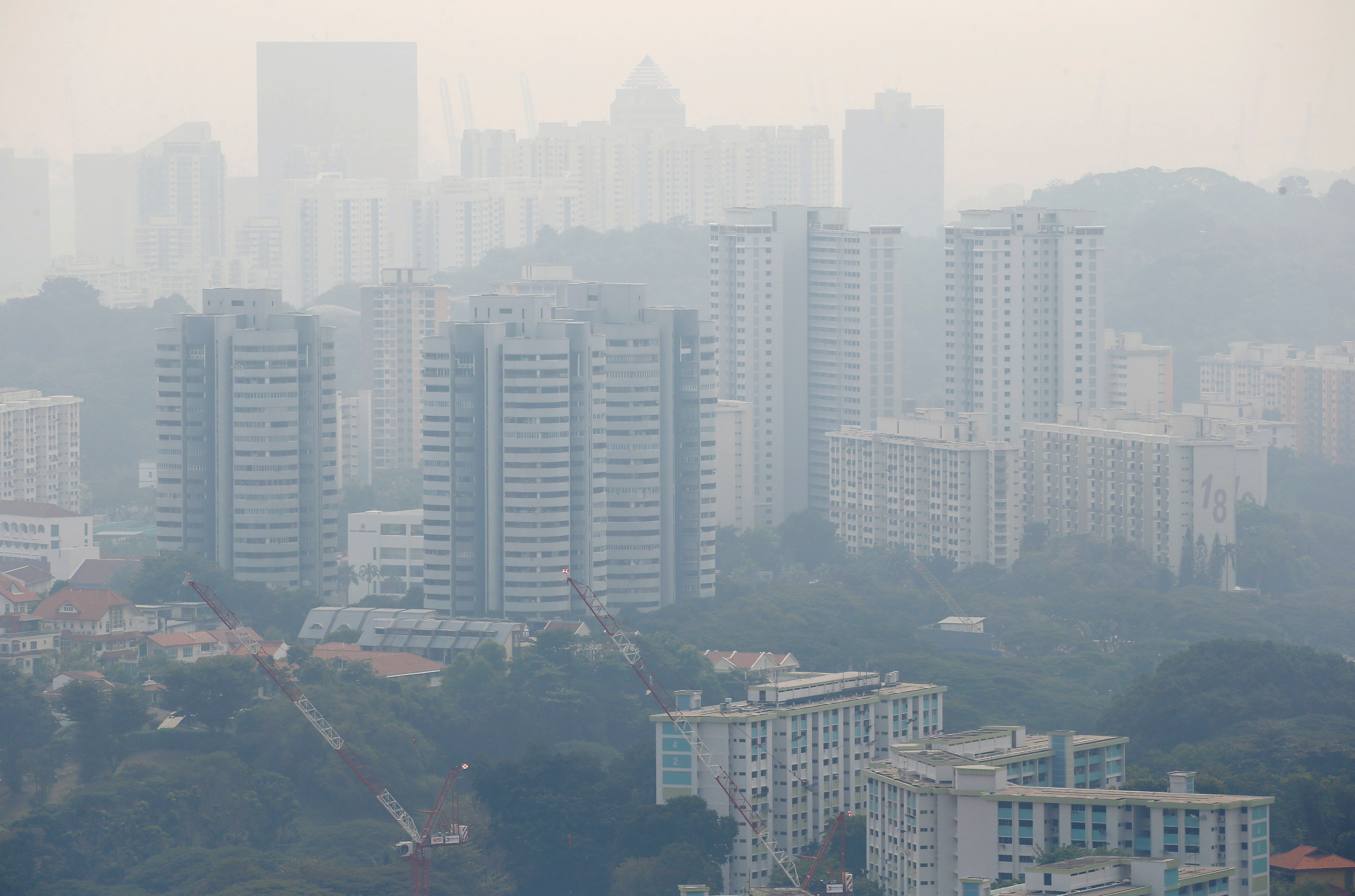Buildings are shrouded by haze in Singapore. Photo: Reuters
