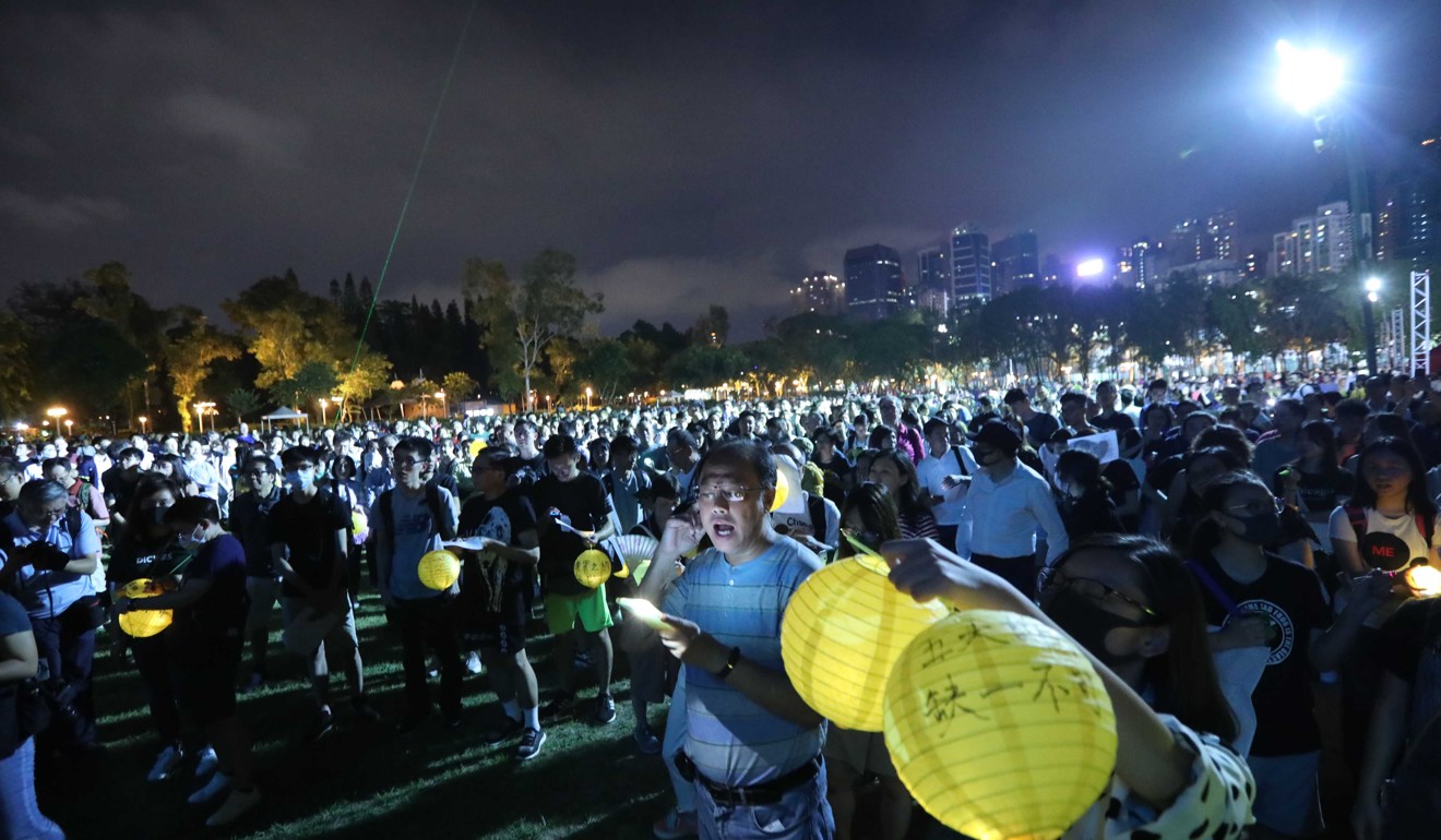 Protesters singing in Victoria Park. Photo: Felix Wong