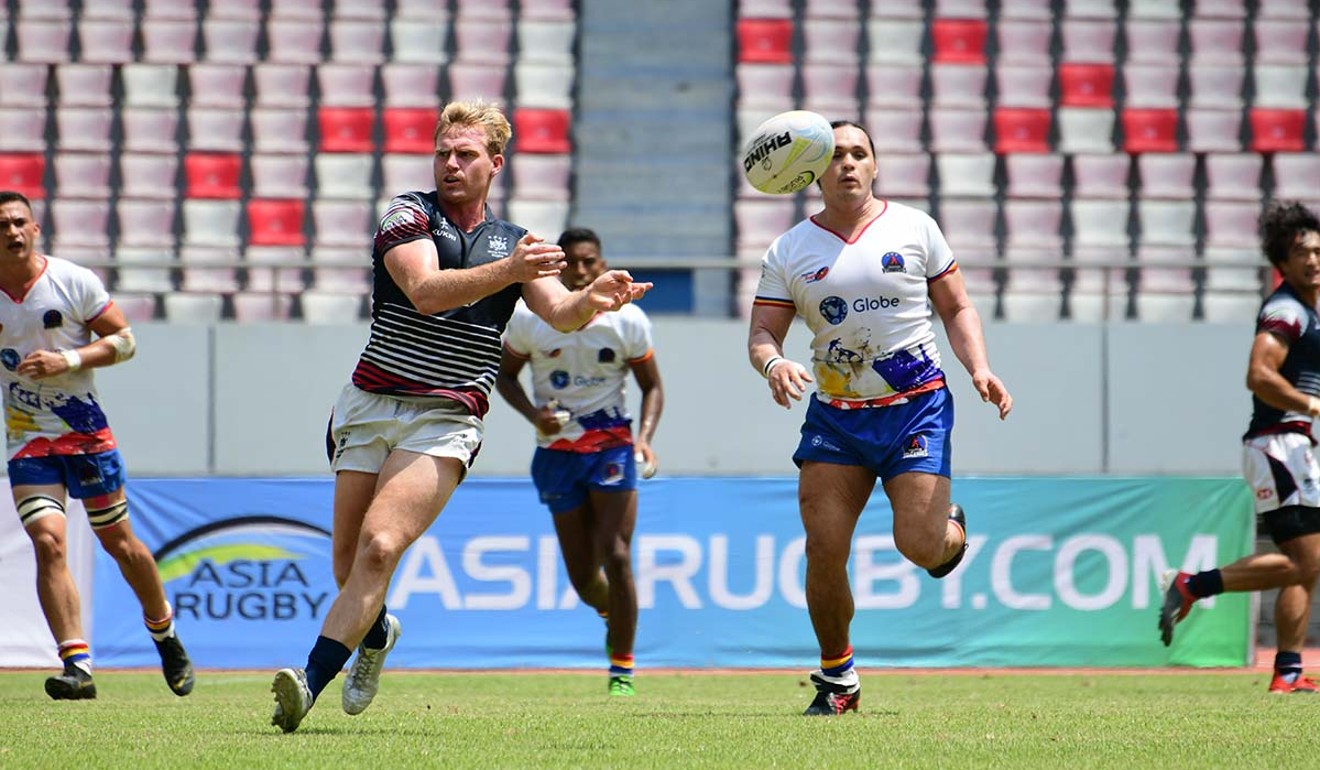 Jamie Hood dishes a no-look pass against the Philippines. Photo: Asia Rugby