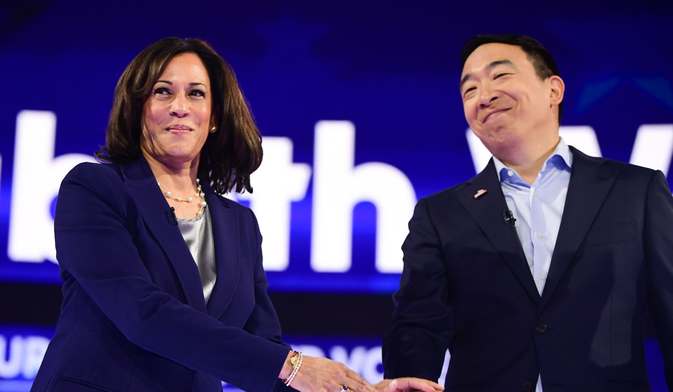 Democratic presidential hopefuls Kamala Harris and Andrew Yang arrive on stage for the third Democratic primary debate in Houston, Texas, on Thursday. Photo: AFP