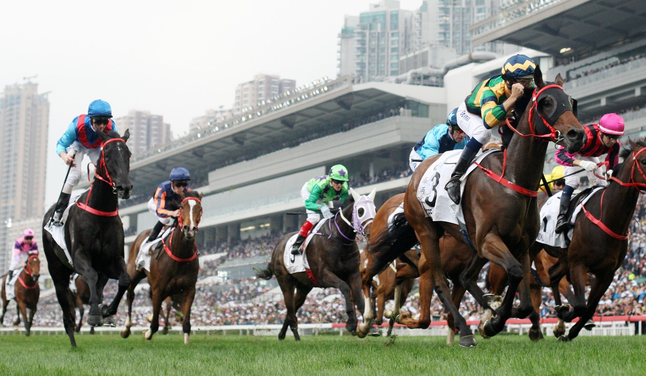 Hugh Bowman pumps his fist as Furore takes out this year’s Hong Kong Derby.