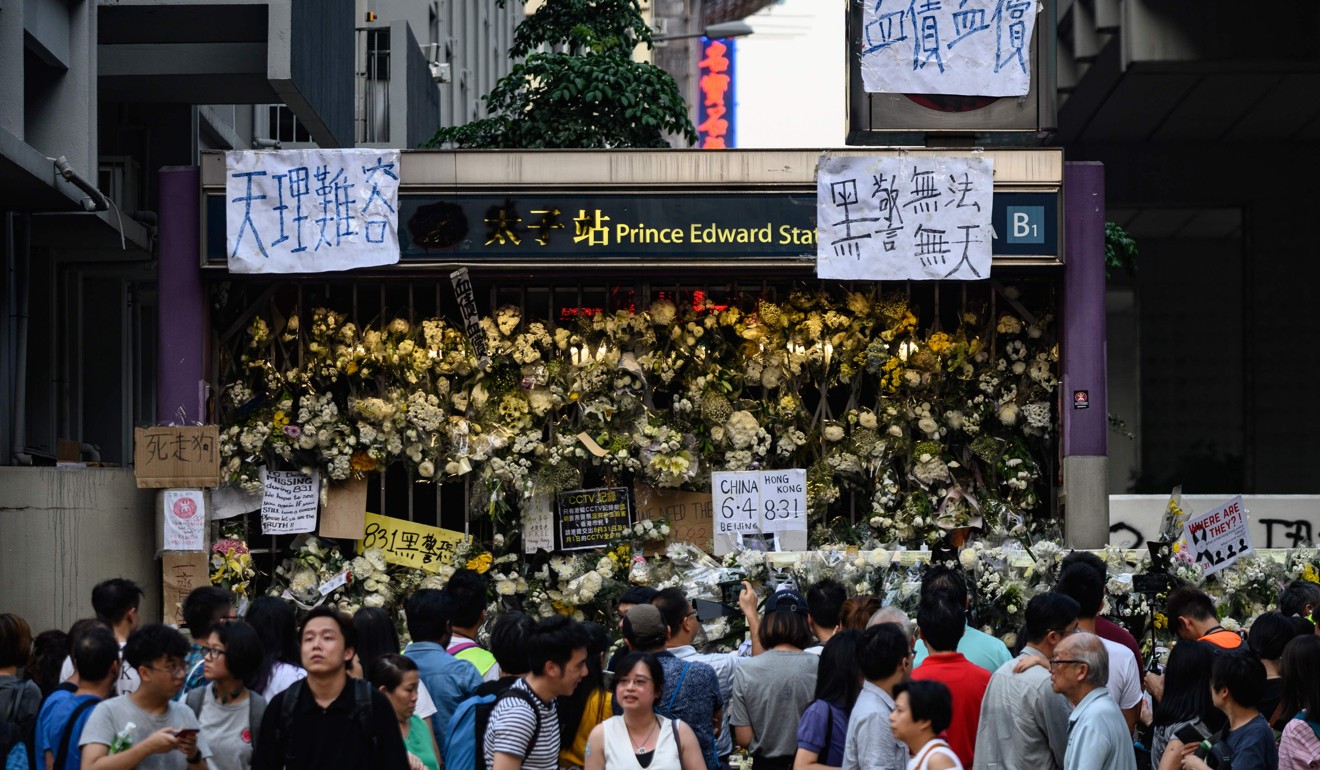 A makeshift memorial stands at the entrance to Prince Edward station. Flowers were left by citizens in the belief that there were deaths in the station on August 31. Photo: AFP