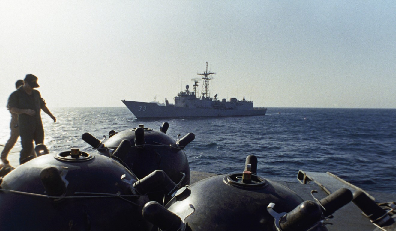 Mines aboard an Iranian ship are inspected by US forces in this 1987 file photo. Photo: AP