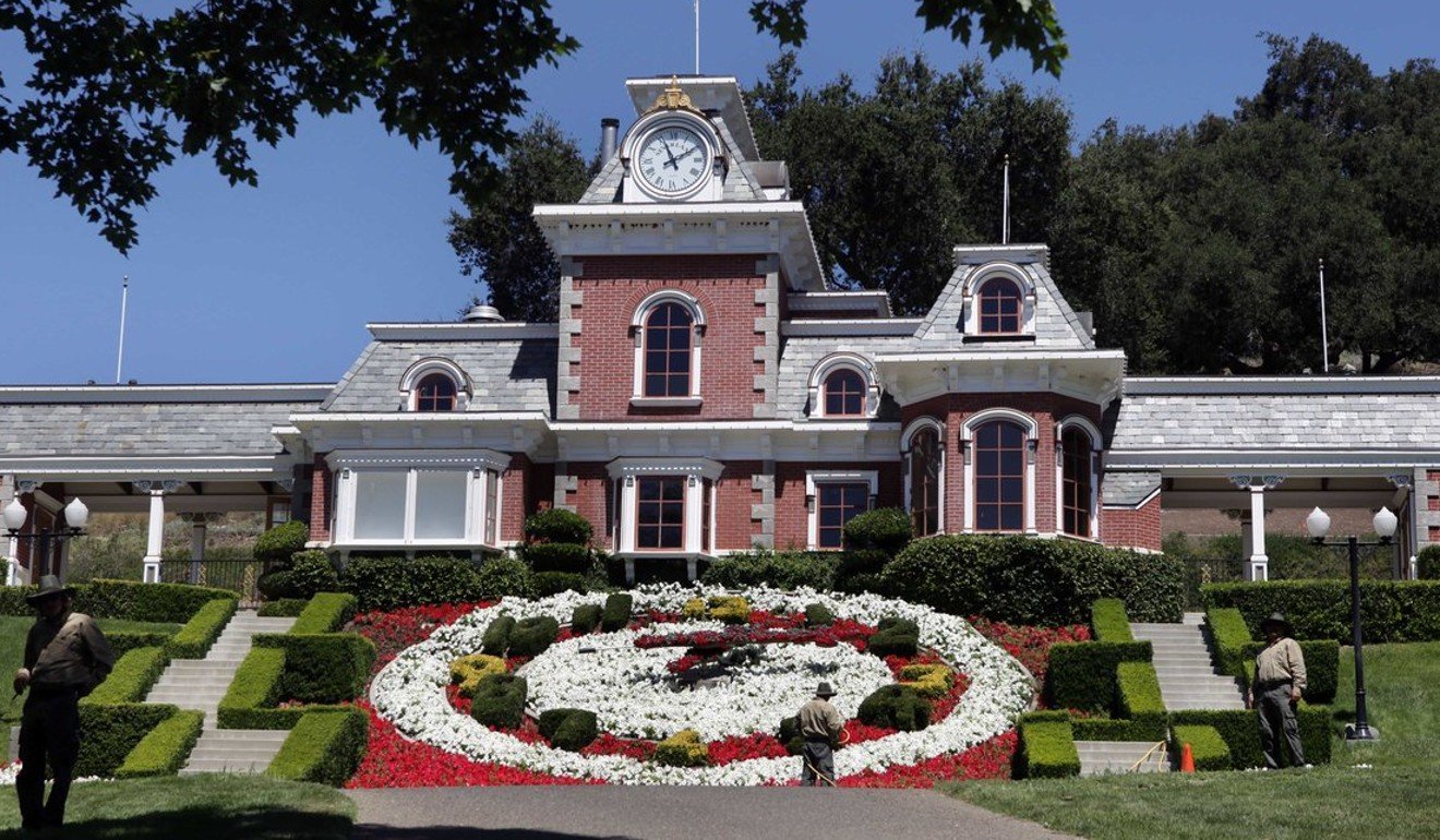 Workers maintain the flower beds outside the railway station at former estate of the late pop star Michael Jackson, once called Neverland Ranch, which has been for sale since 2015. Photo: AP