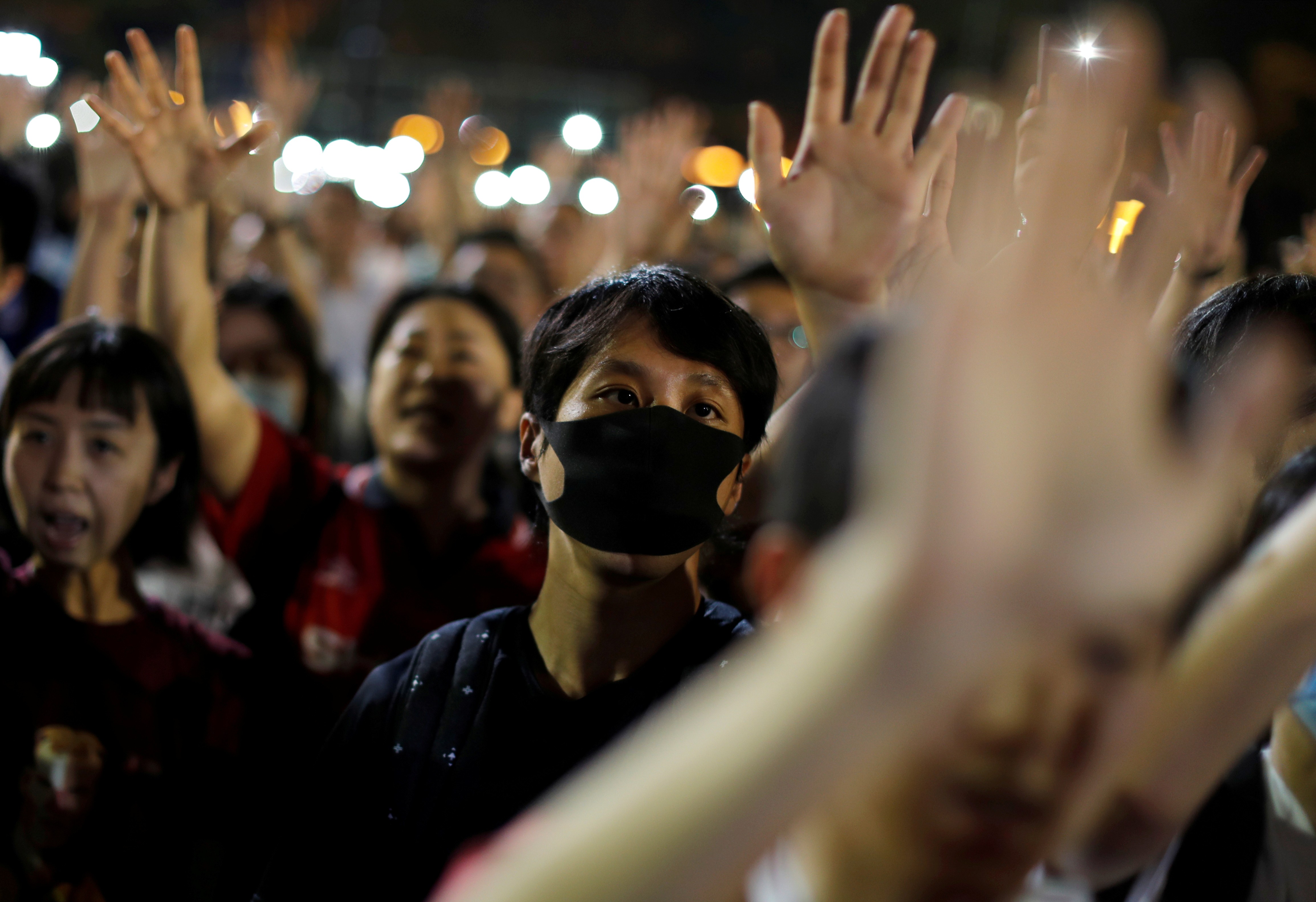 Anti-government demonstrators protest at Victoria Park, Hong Kong, on September 18. No matter how the current mess ends, the tens of thousands of Hongkongers who hold other passports are now looking to leave the city. Photo: Reuters