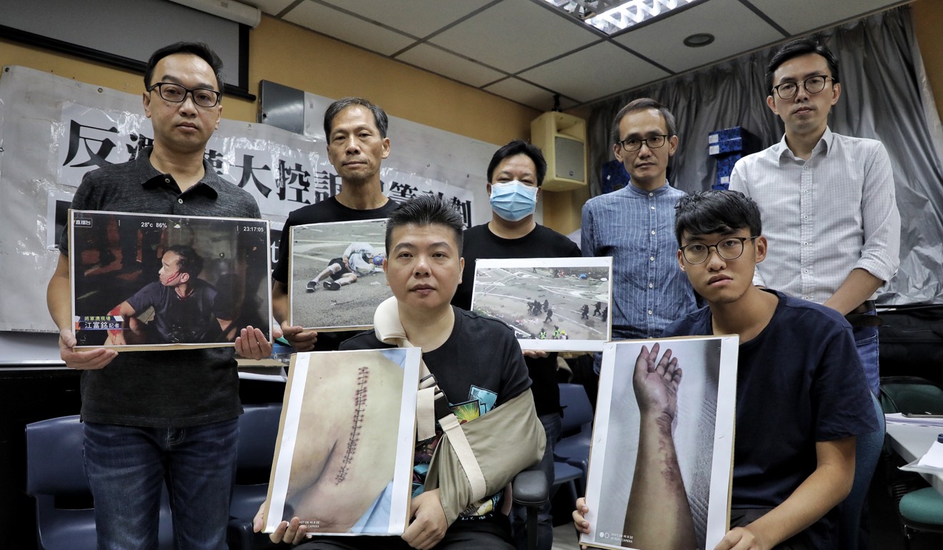 (From left) Samson Chan, Ng Ying-mo, Lucas Lam, Ng Hong-luen, Andy Chui, Cham Lu and Avery Ng Man-yuen attend a media briefing for the “Sue the Abuser” crowdfunding scheme. Photo: Handout