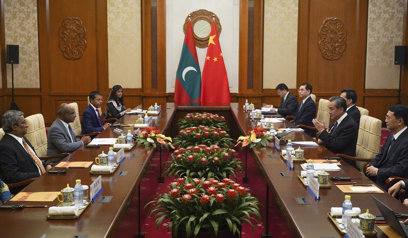 Chinese Foreign Minister Wang Yi speaks with Maldives’ Foreign Minister Abdulla Shahid at the Diaoyutai State Guesthouse in Beijing. Photo: AP
