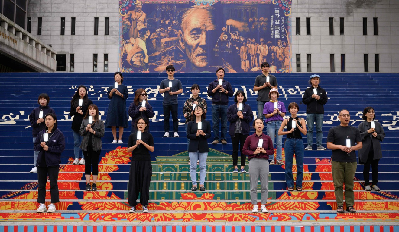 Environmental activists stage a performance as part of a global climate strike in Seoul, South Korea. Photo: AFP