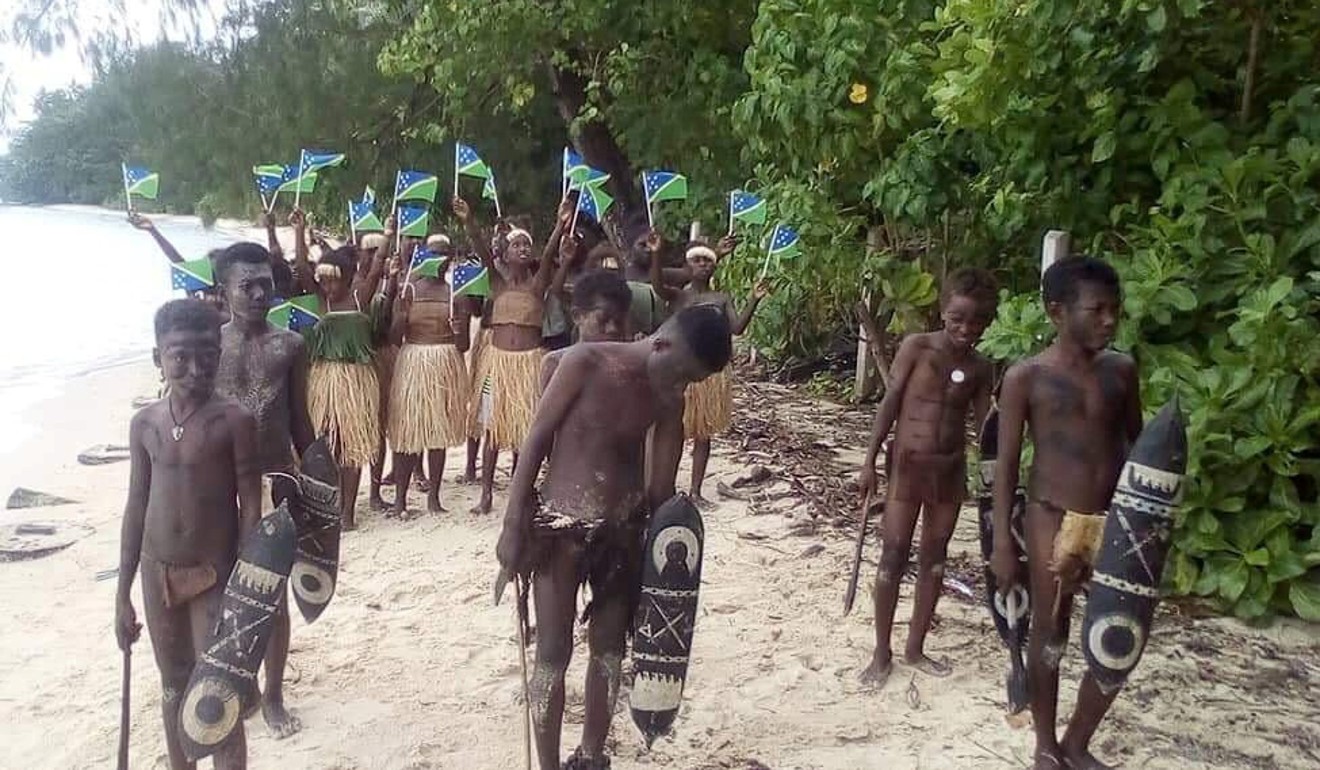 Students attend a climate change protest on Marovo Island, Solomon Islands, on Friday. Photo: Reuters