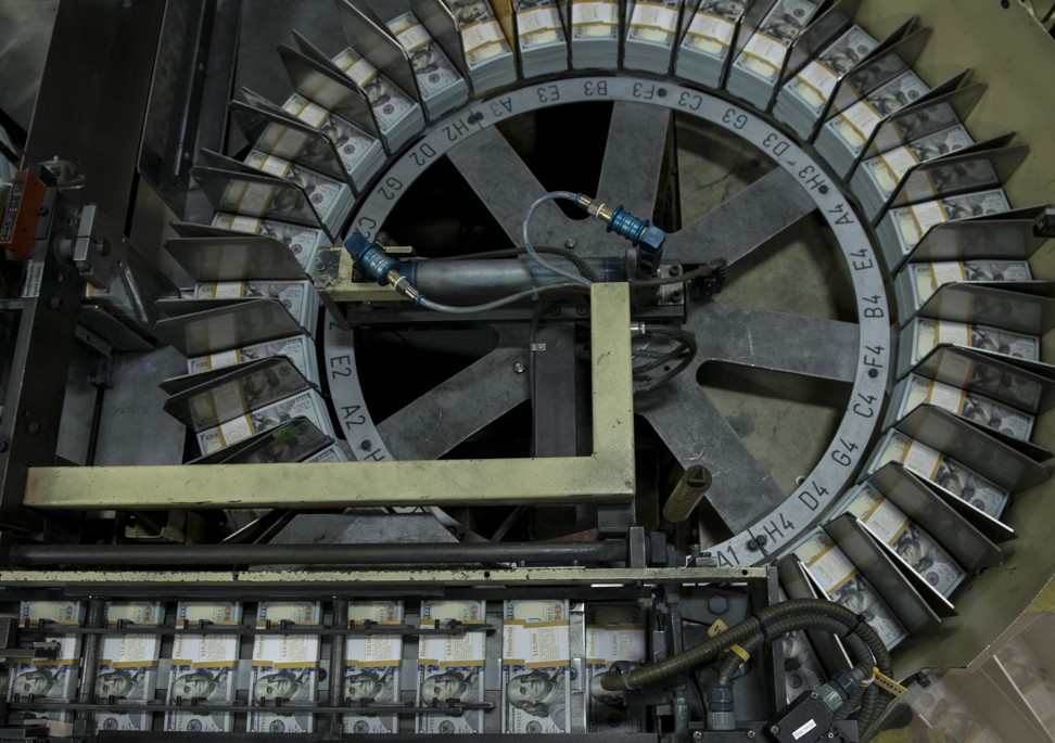 Stacks of money at the US Bureau of Engraving and Printing's Western Currency Facility in Fort Worth, Texas. Photo: AFP