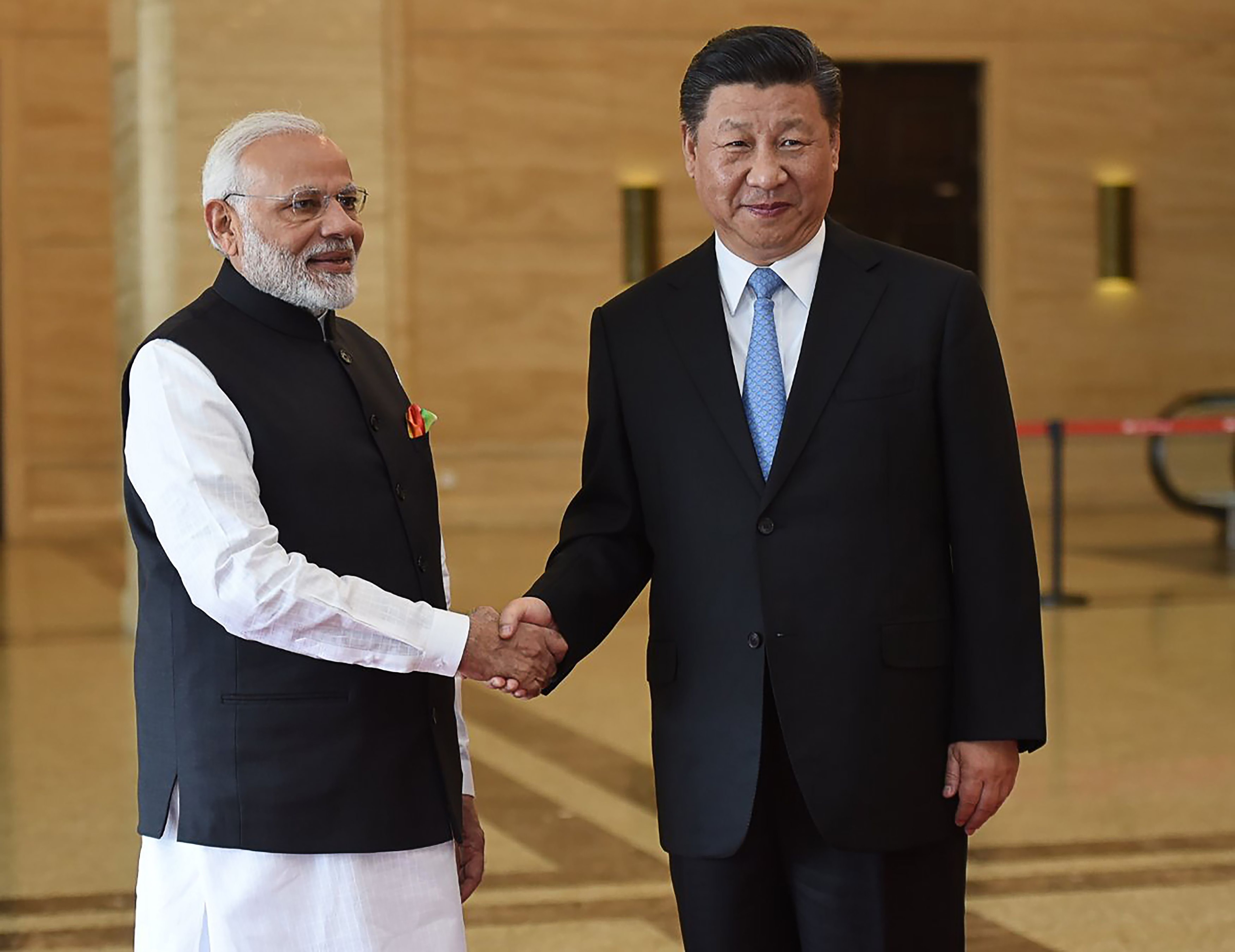 India’s Prime Minister Narendra Modi shakes hands with Chinese President Xi Jinping in Wuhan, China. Photo: AFP
