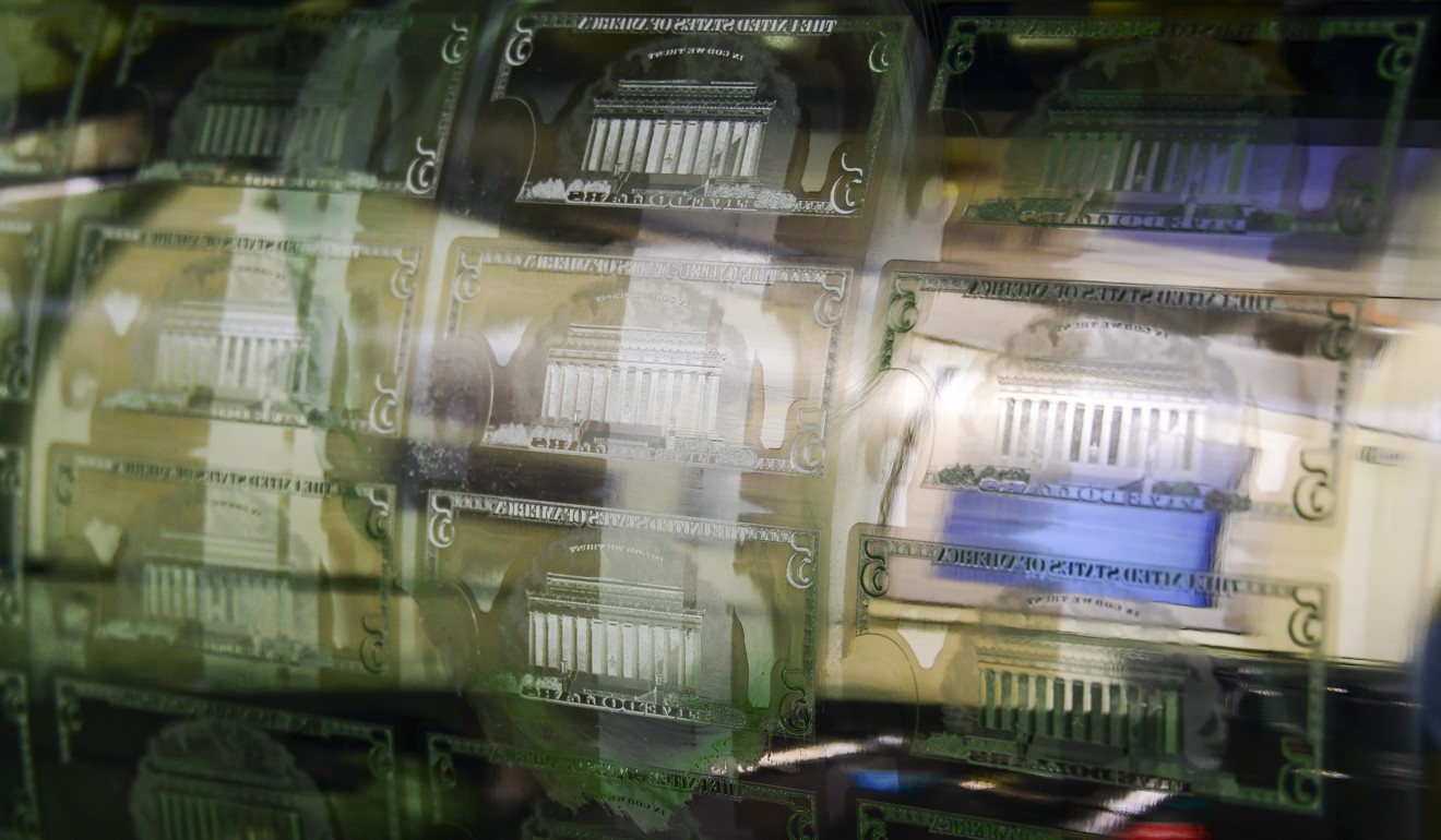 US$5 notes are printed at the US Treasury's Bureau of Engraving and Printing in Washington. Photo: AFP