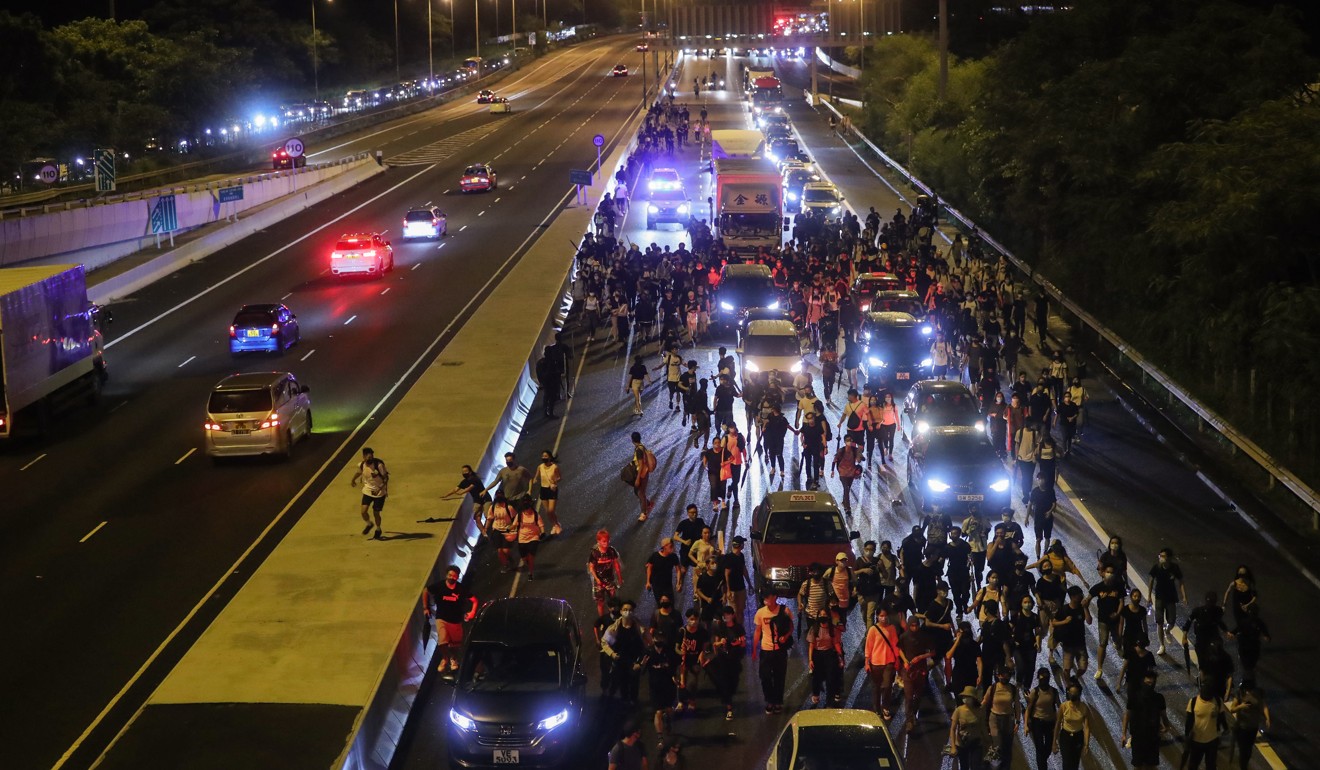 Hundreds of protesters march on North Lantau Highway in a bid to paralyse transport links to Hong Kong International Airport on September 1. Photo: Sam Tsang