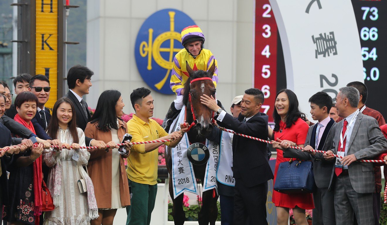 Ping Hai Star’s connections celebrate the Hong Kong Derby victory.