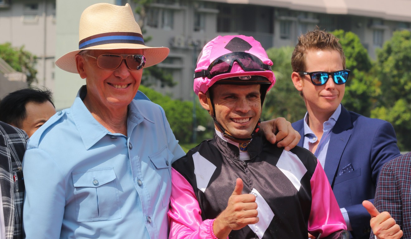 Trainer John Moore with jockey Aldo Domeyer after a win last season.