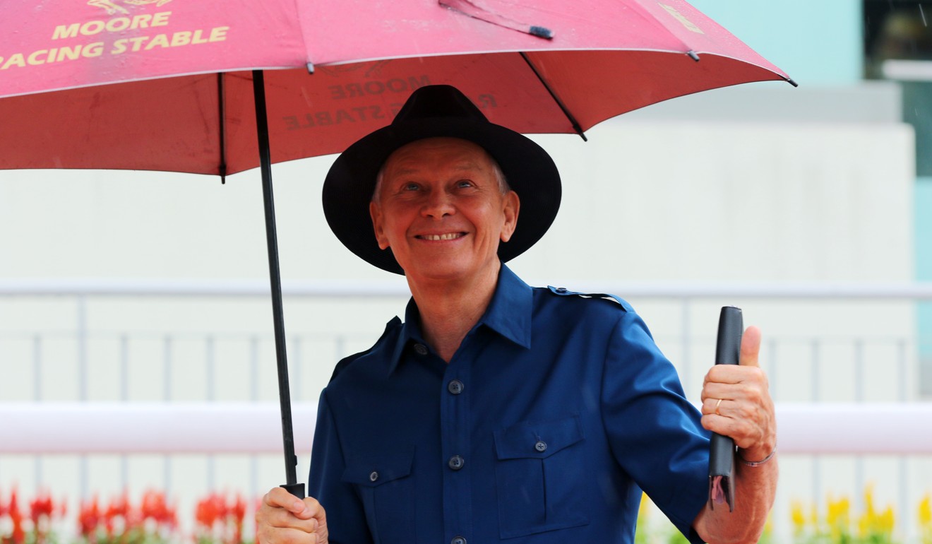 John Moore celebrates the win on Aethero at Sha Tin.