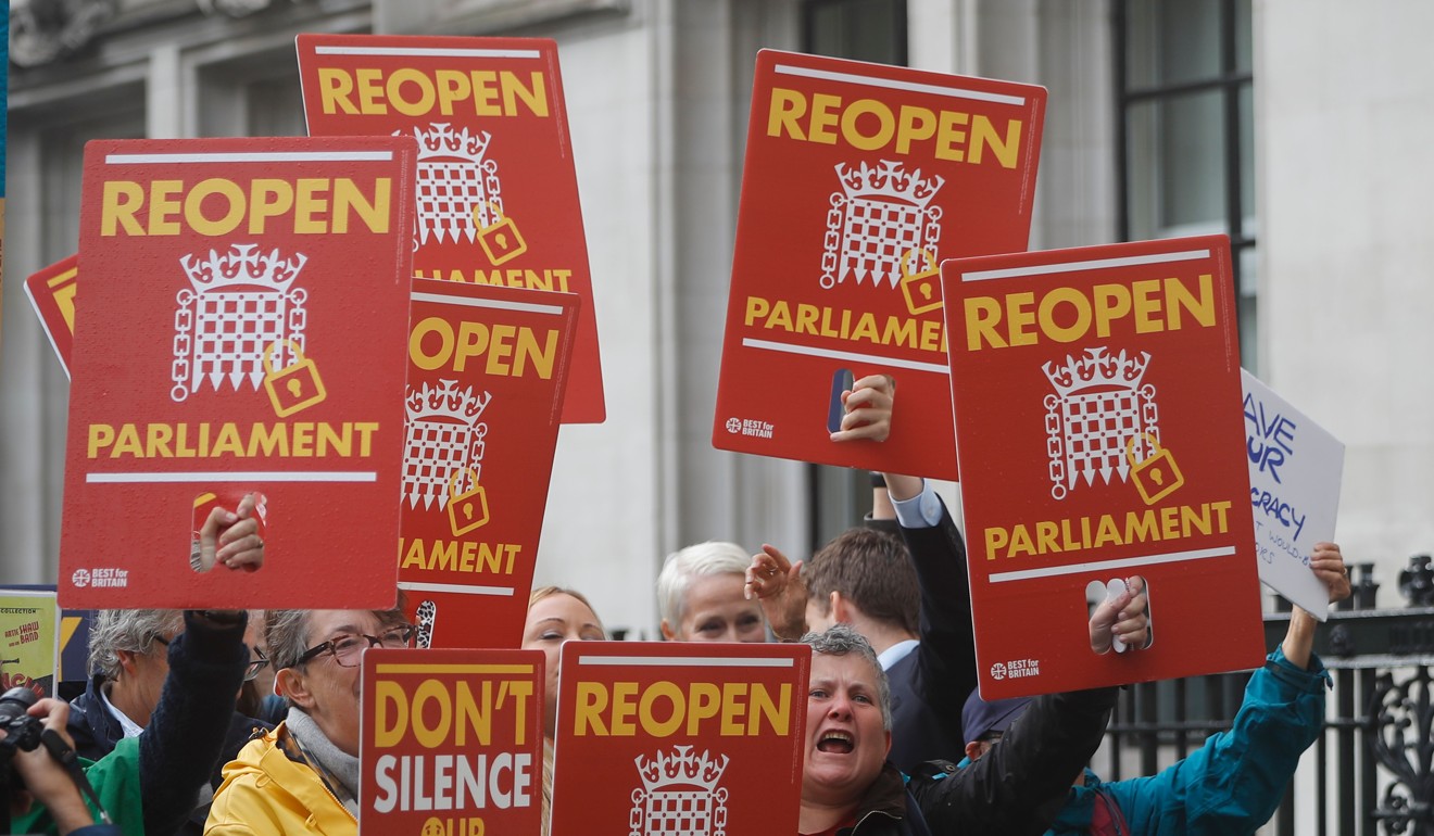 Protesters demanded parliament be recalled outside the Supreme Court in central London on Tuesday. Photo: AFP