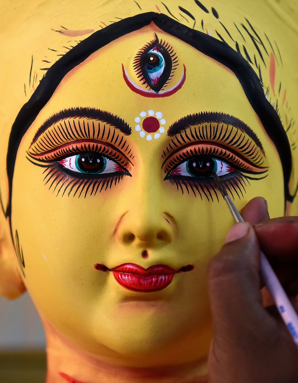 An idol of the goddess Durga being made by idol designer Kishori Mohan Pal for this year’s festival. Photo: The Times of India