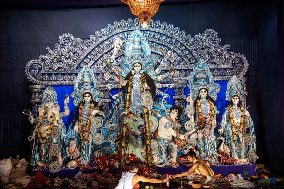 Devotees worshipping the goddess Durga. Photo: Alamy
