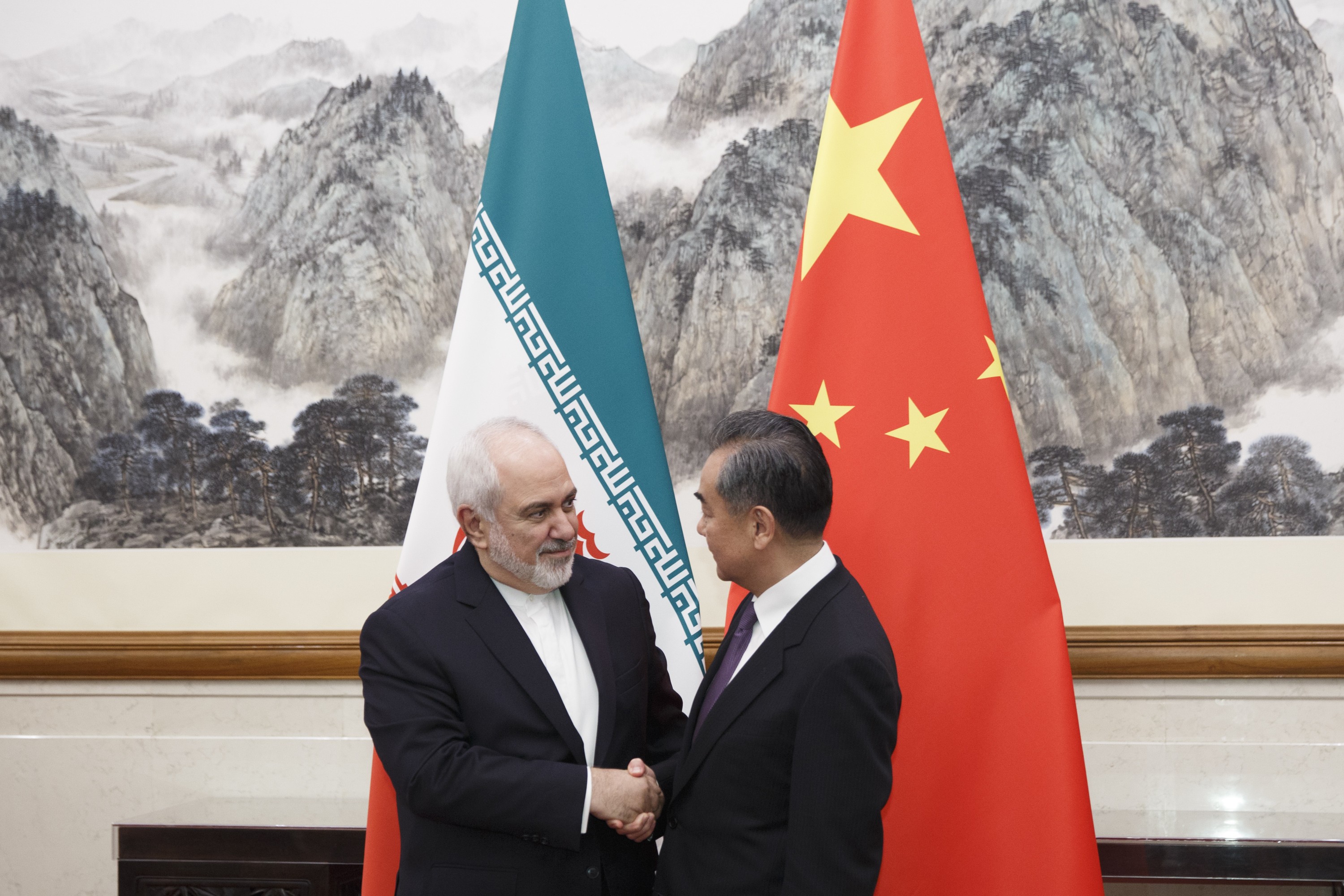Iranian Foreign Minister Mohammad Javad Zarif meets Chinese Foreign Minister Wang Yi (right) at the Diaoyutai State Guesthouse, in Beijing on May 17. Photo: AP