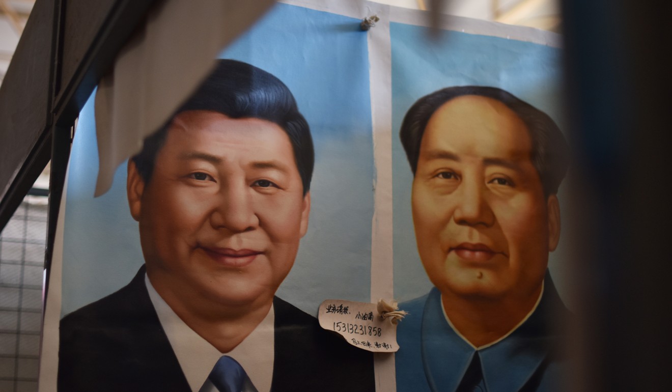 Portraits of President Xi Jinping and the late communist leader Mao Zedong in Beijing. Among Chinese intellectuals there is widespread disapproval of the Mao-style personality cult surrounding Xi. Photo: AFP