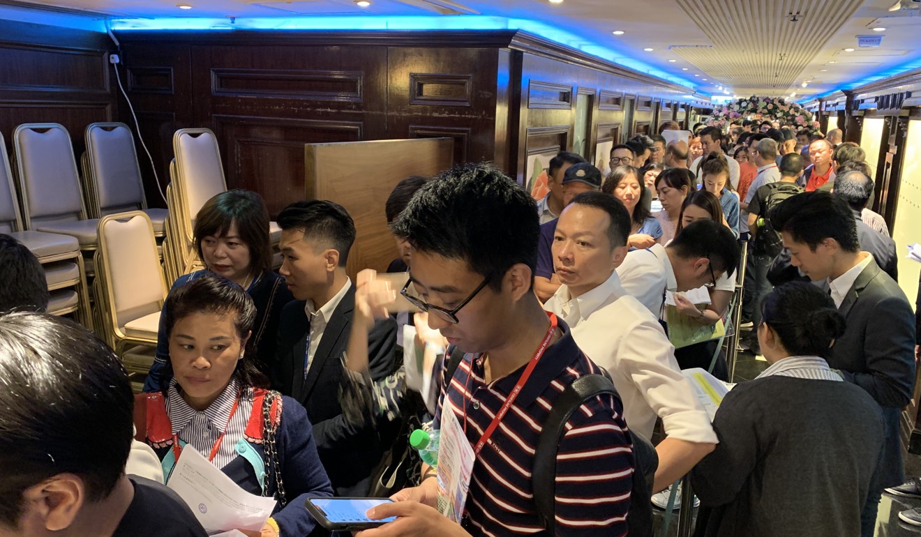 Prospective buyers on Friday at the sales office of Upper Riverbank at Kai Tak. Photo: SCMP Pictures