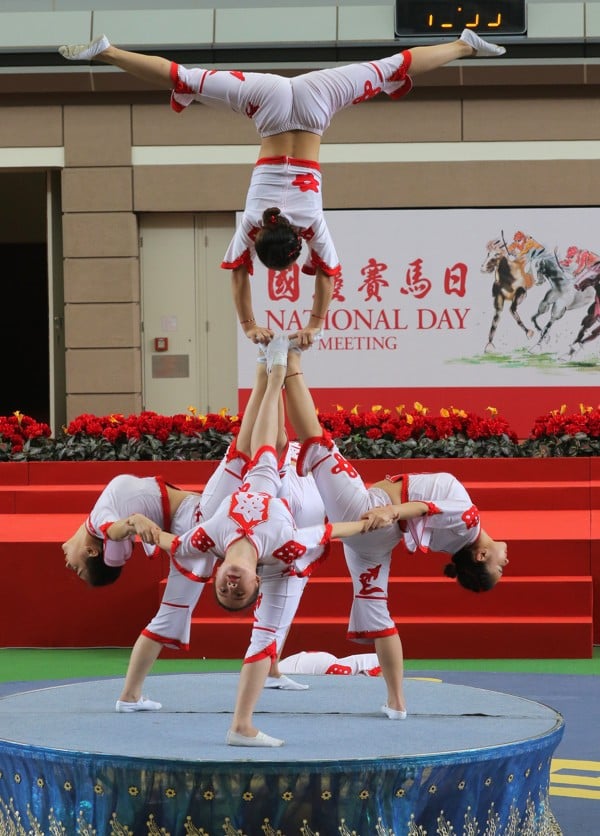 The Shenzhen Fuyong Acrobatic Troupe perform during the National Day race meeting at Sha Tin in 2018. Photo: Kenneth Chan