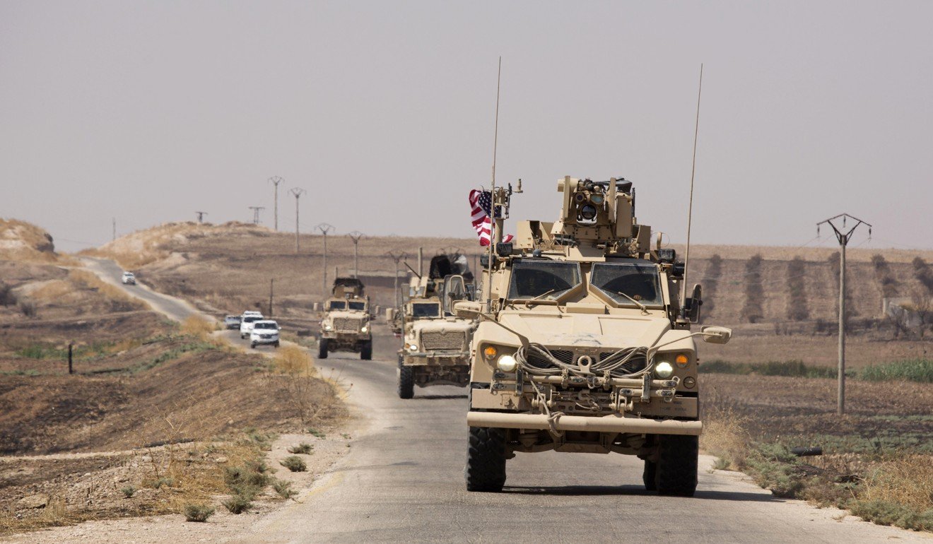 US armoured vehicles travel in a joint patrol with Turkish forces earlier this month. Photo: AP
