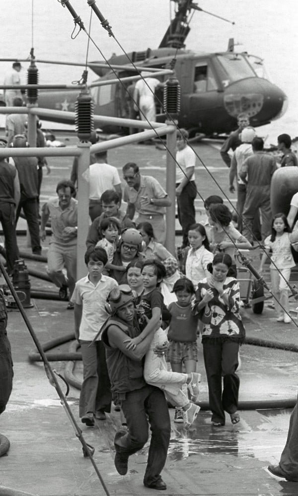 US Marines evacuate civilian children during the final days of the Vietnam war. Photo: AP