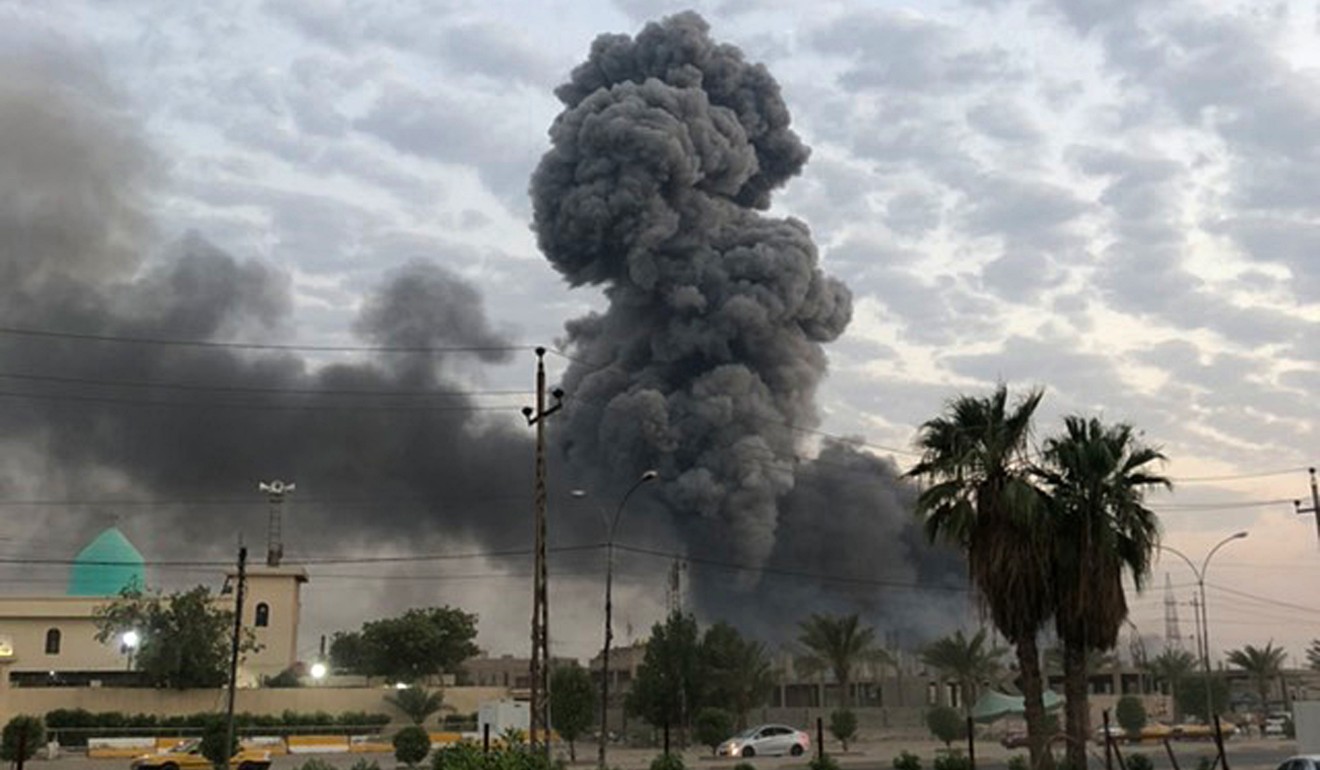 Plumes of smoke rise after an explosion near Baghdad. Iraq has called for an end to new wars. Photo: AP