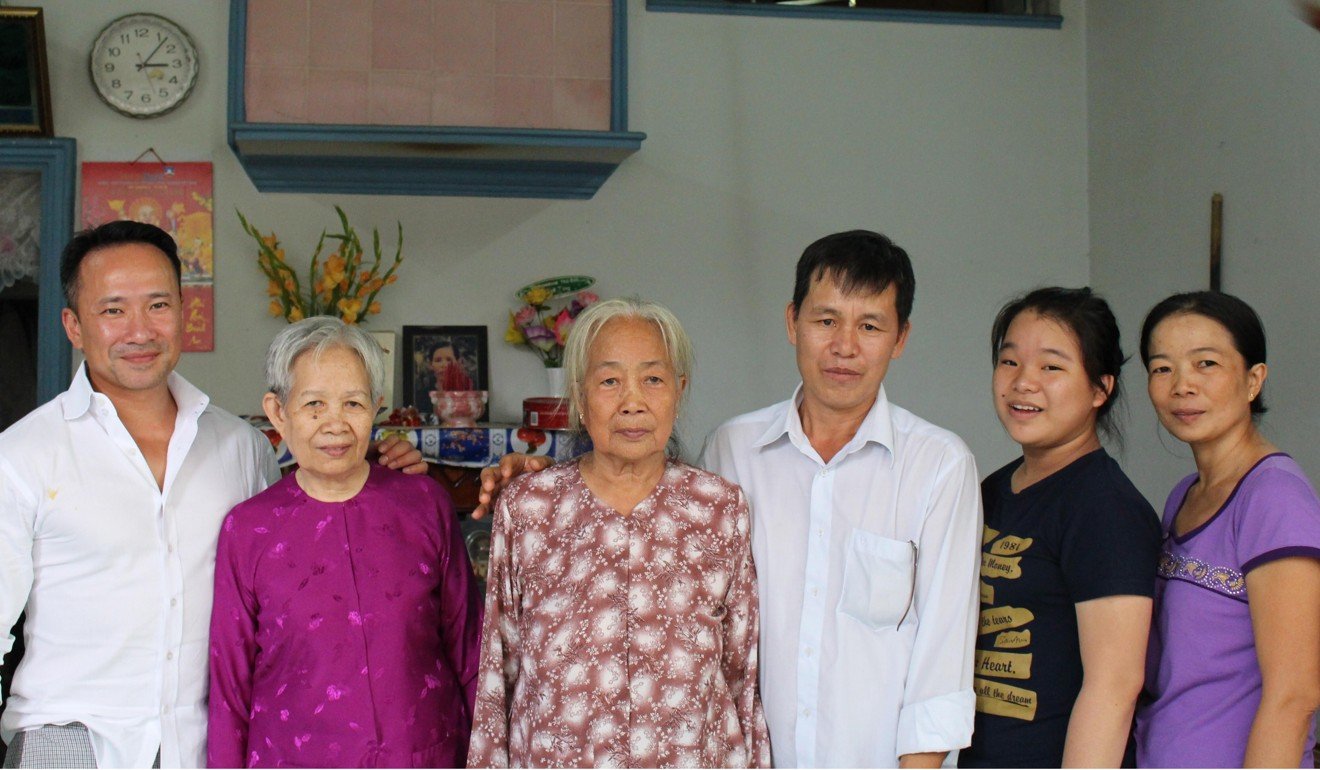 David Matthew Redmon, left, next to his mother and her family following their reunion at Tan Son Nhat airport, Ho Chi Minh City. Photo courtesy of David Matthew Redmon