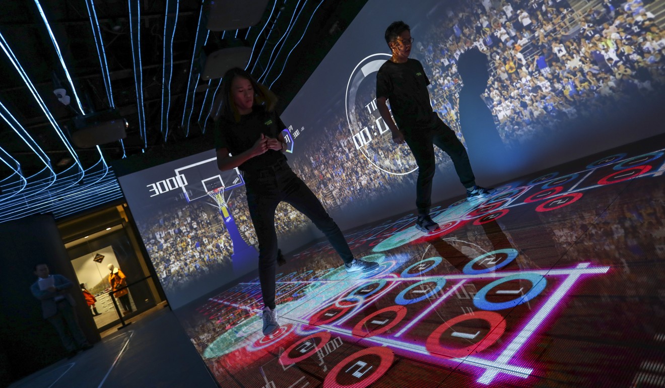 An interactive LED floor display is among the features of the new Sports Expo. Photo: Jonathan Wong