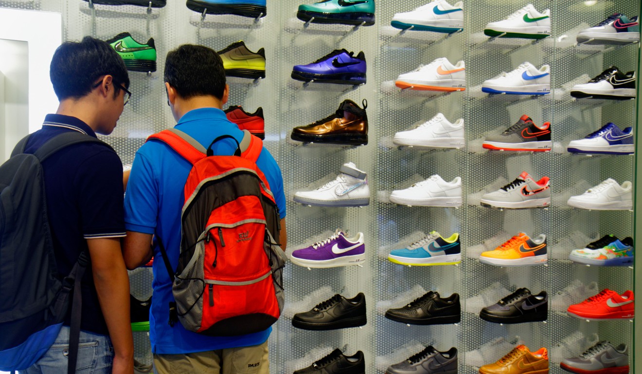 Fa Yuen Street is also known as “Sneaker Street” because of its array of sports shoe shops. Photo: Alamy