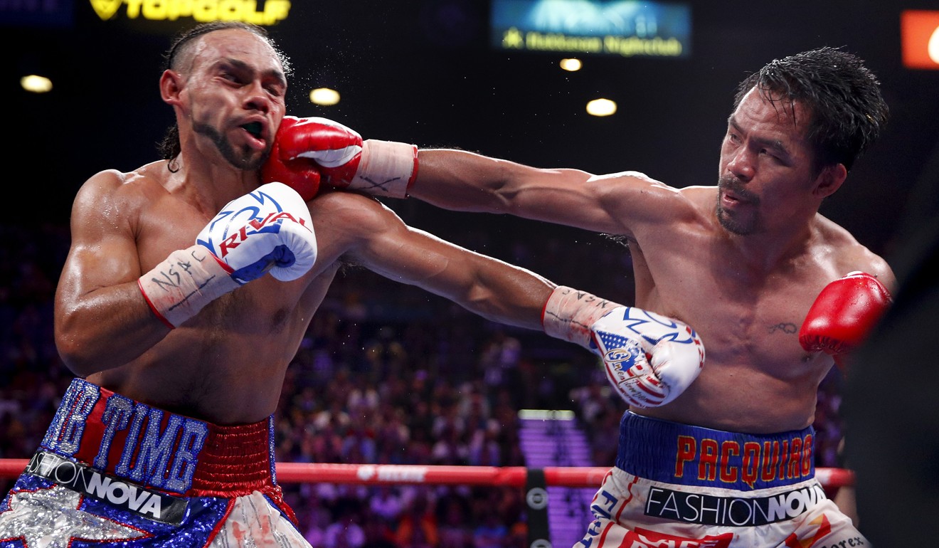 Manny Pacquiao (right) scored a surprise win against Keith Thurman to claim the WBA welterweight title back in July. Photo: AP