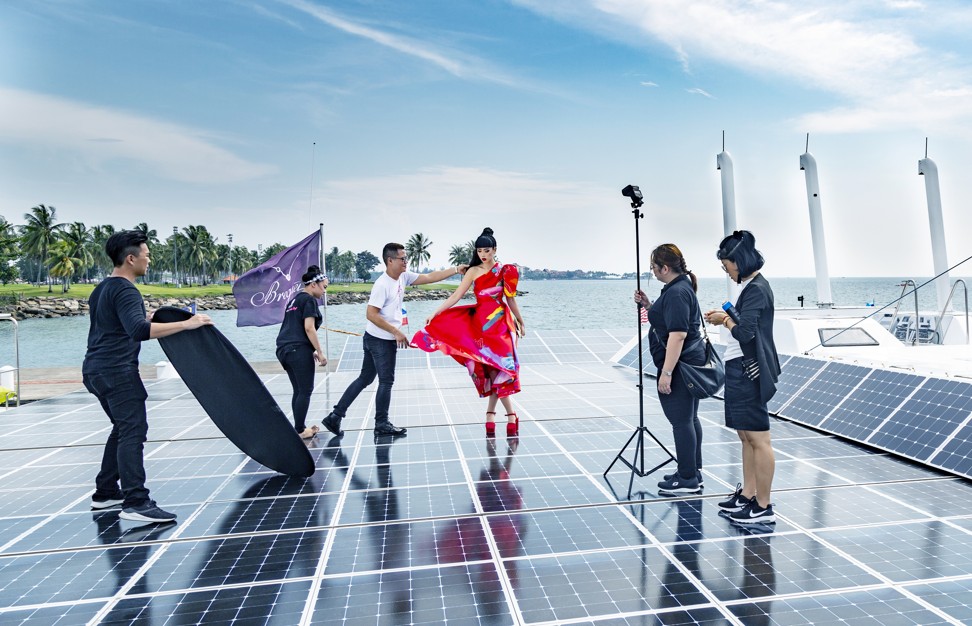Behind the scenes at Kota Kinabalu, Malaysia of Jessica Minh Anh photo shoot on the Race for water that will host Minh Anh’s solar-powered catwalk.