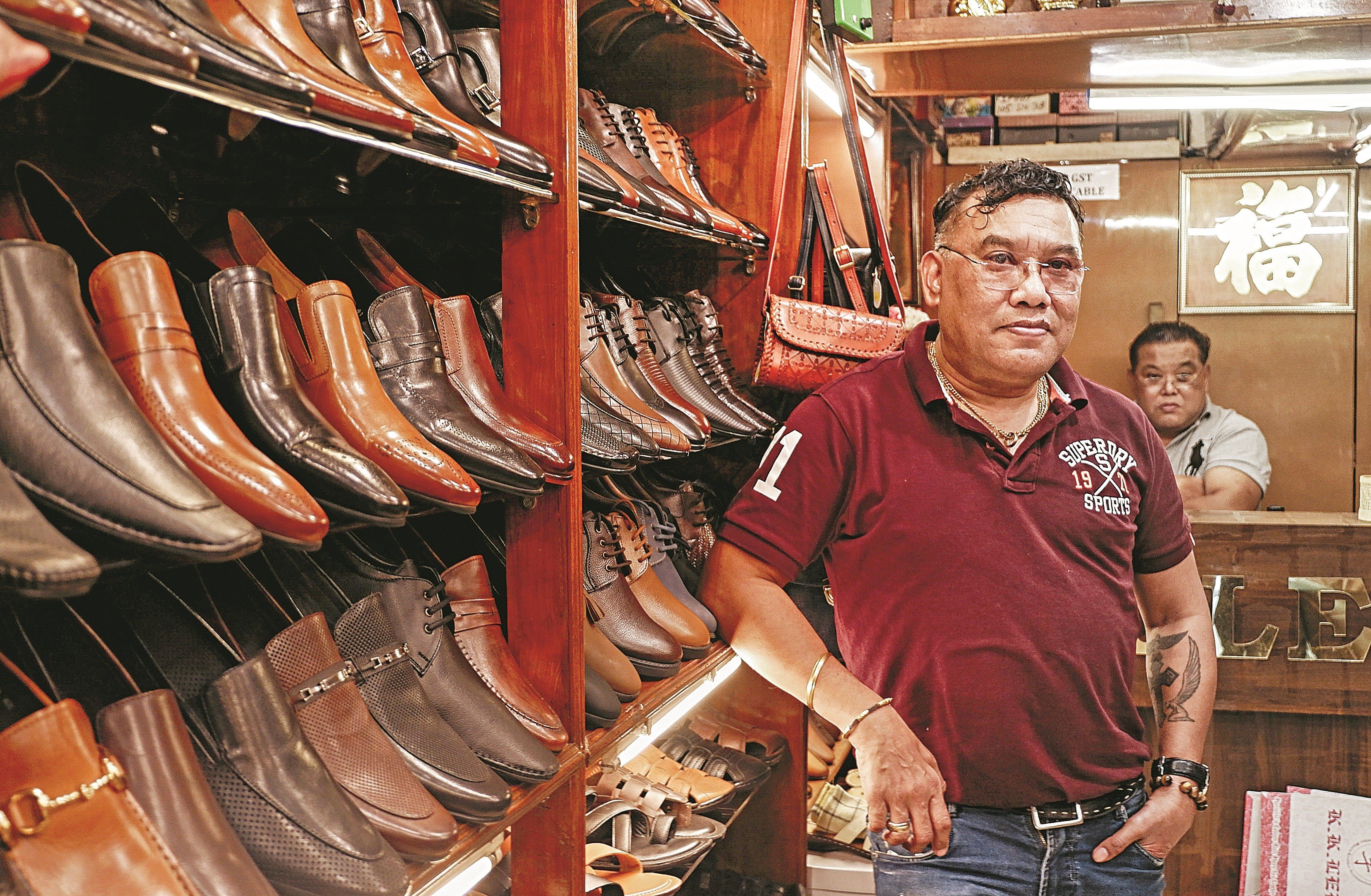 Kenneth Lee at his shoe shop in Khan Market, Delhi, India. He is one of a dwindling number of ethnic Chinese bespoke shoemakers in the country today. Photo: B. Ajay Sharma