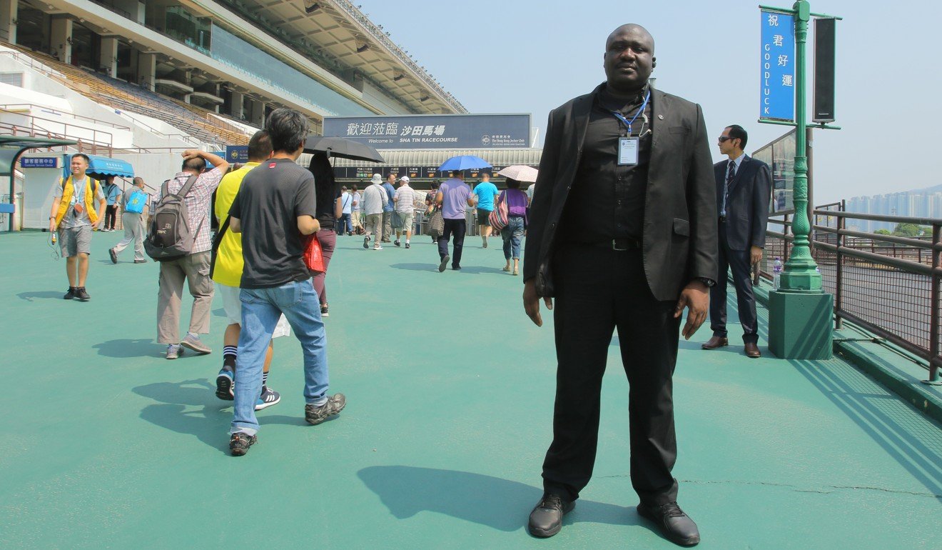 A security guard keeps an eye on proceedings at Sha Tin on Tuesday. Photo: Handout