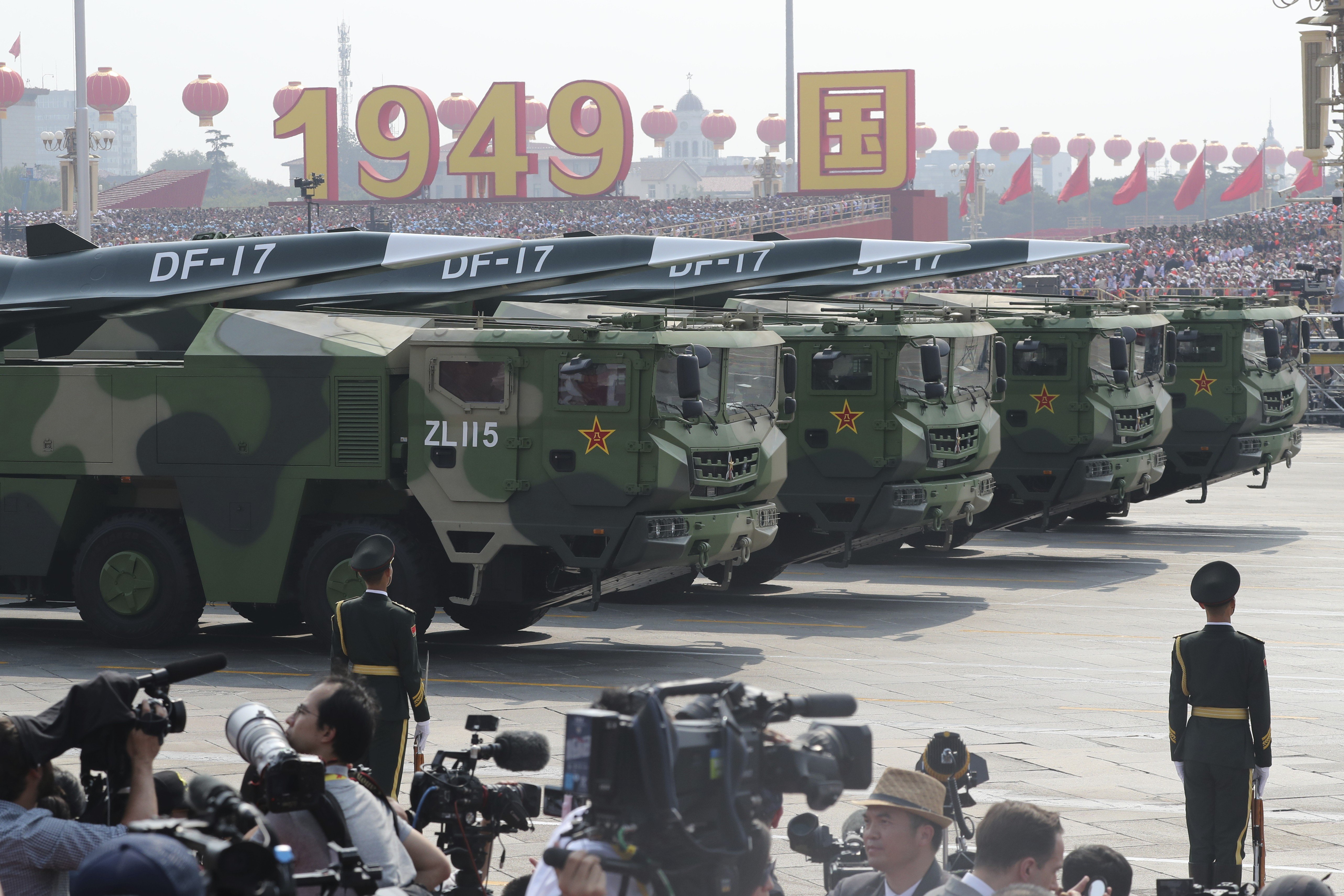 Military vehicles carry DF-17 missiles capable of reaching the US mainland during the parade to mark 70 years of the People’s Republic. Photo: AP