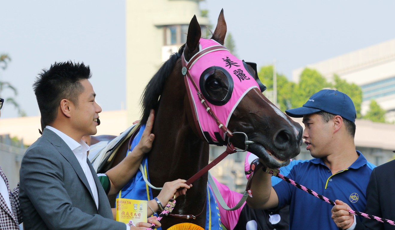 Owner Patrick Kwok looks over Beauty Generation after his win on Tuesday.