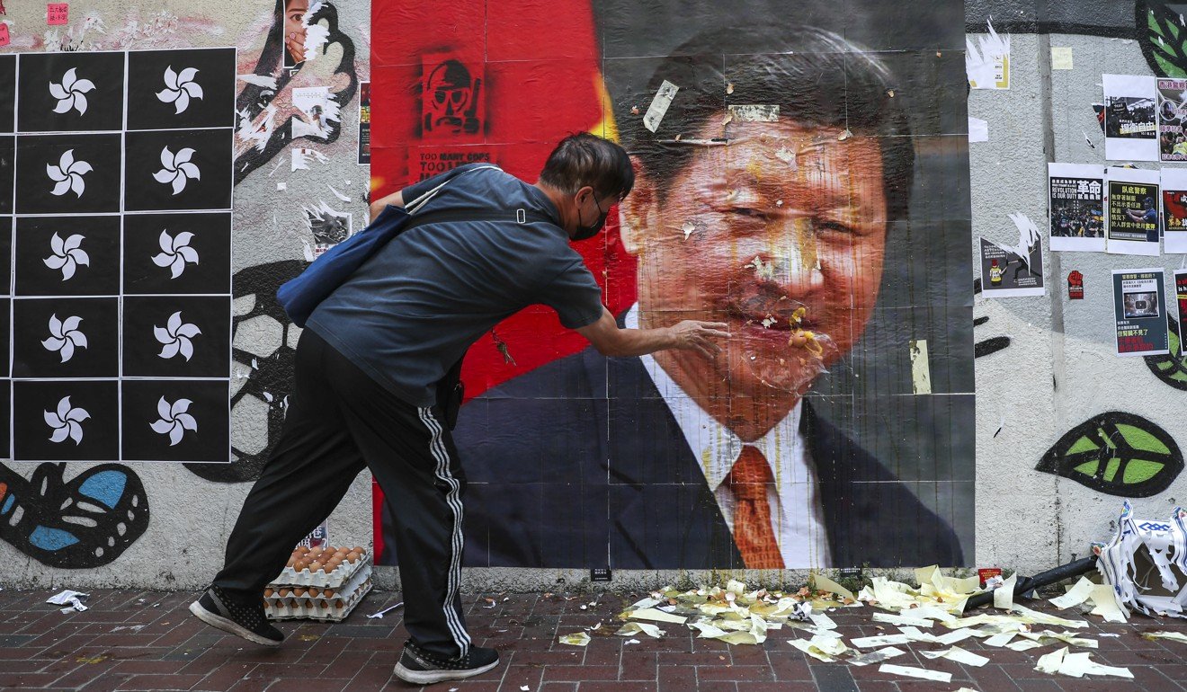 A defaced image of Chinese President Xi Jinping is seen in Hong Kong. Photo: Sam Tsang