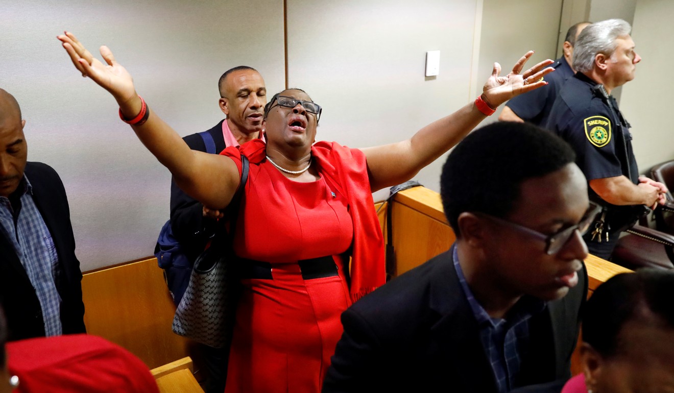 Botham Jean’s mother, Allison Jean, rejoices in the courtroom after former police officer Amber Guyger was found guilty of murder in Dallas, Texas, on Tuesday. Photo: Tom Fox/Dallas Morning News via Reuters