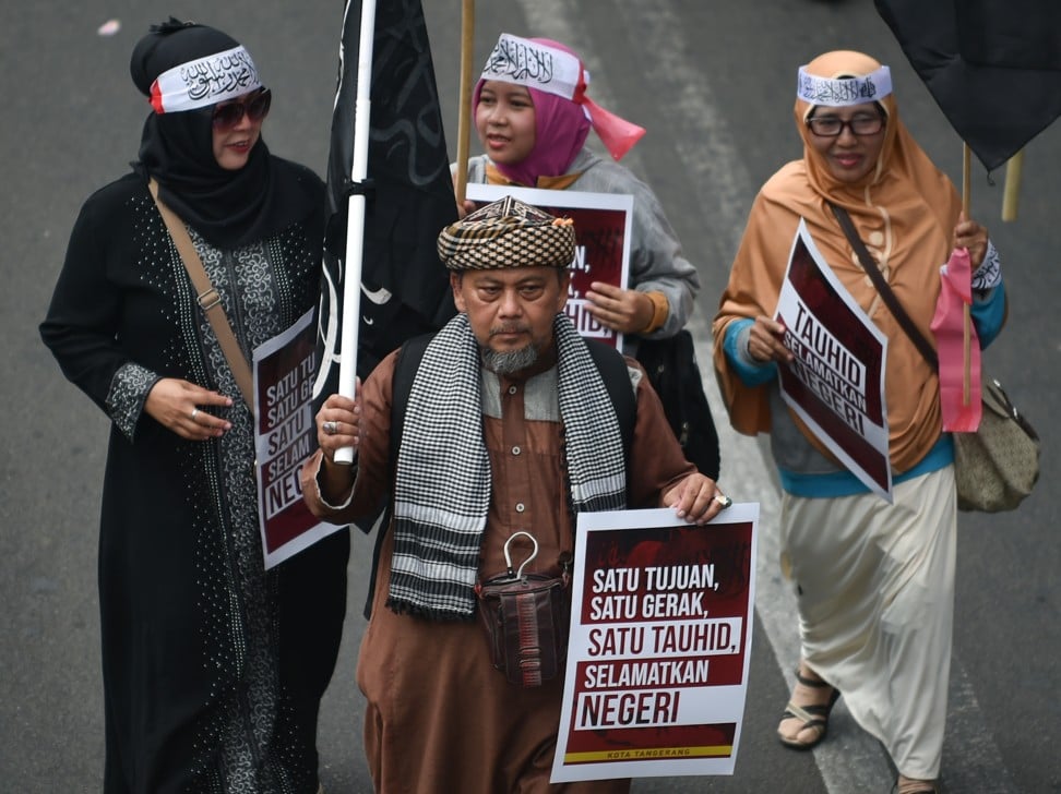 Protesters take part in an anti-government rally in Jakarta on September 28, 2019, demanding that Indonesia's President Joko Widodo not be sworn in as president on October 20 for another term. Photo: AFP