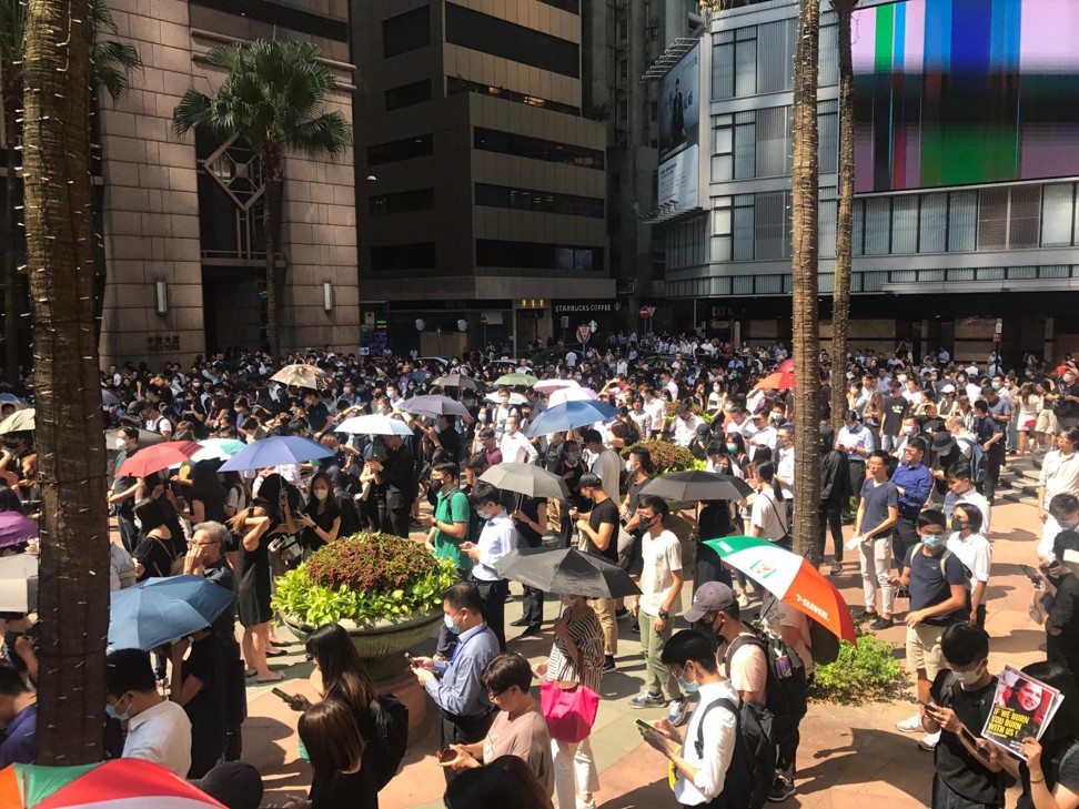 Protesters gather in Millennium Plaza in Sheung Wan at lunchtime. Photo: Gigi Choy