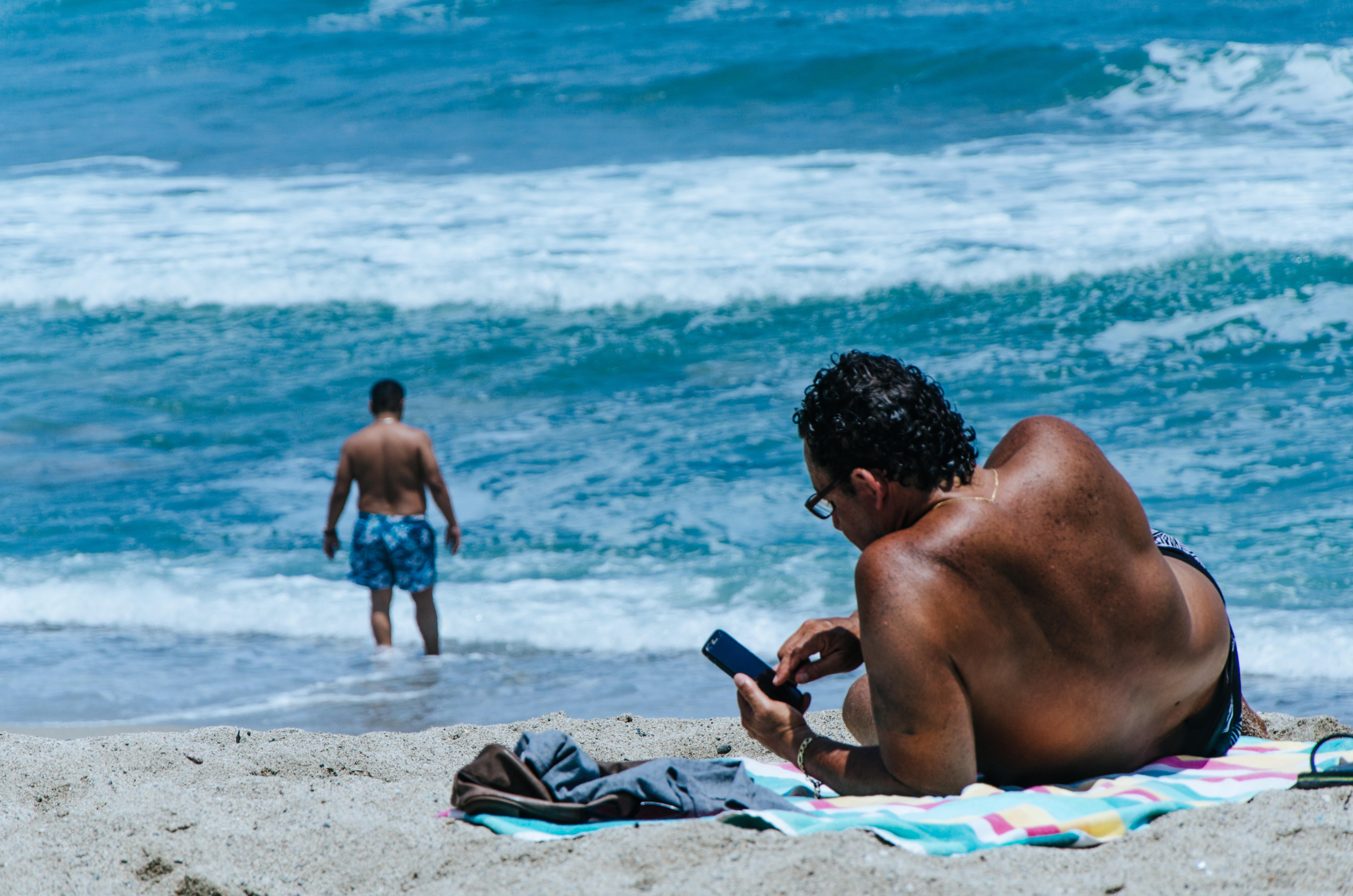 Dating apps have increasingly become an essential part of the travelling experience, connecting travellers seeking casual holiday flings. Photo: Alamy