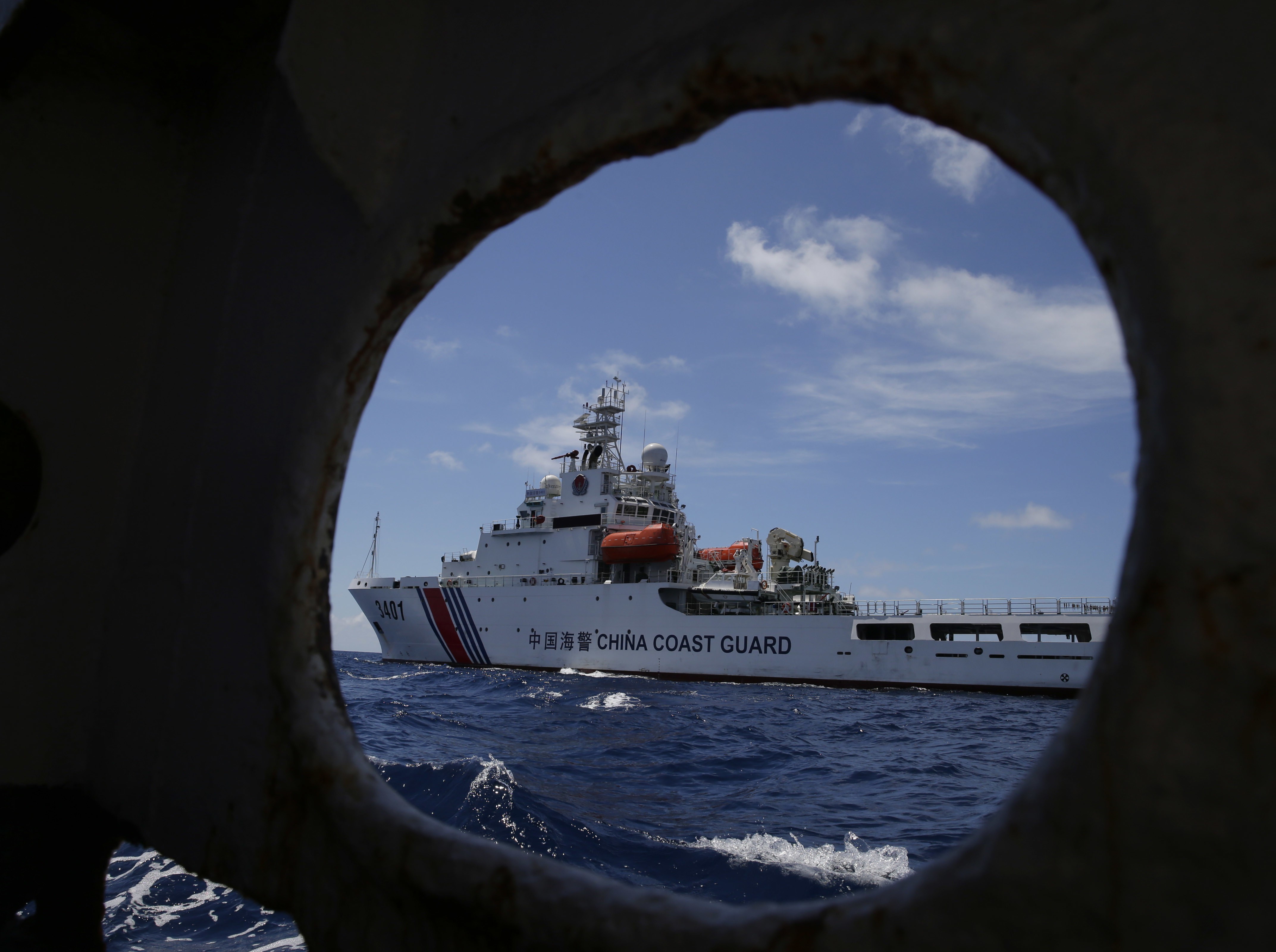 A Chinese coastguard ship attempts to block a Philippine government vessel at Second Thomas Shoal in 2014. Photo: AP