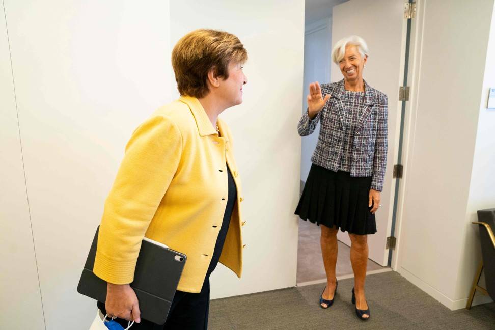 Departing International Monetary Fund managing director Christine Lagarde waves to her successor Kristalina Georgieva at the IMF’s headquarters in Washington on September 2. Photo: AFP